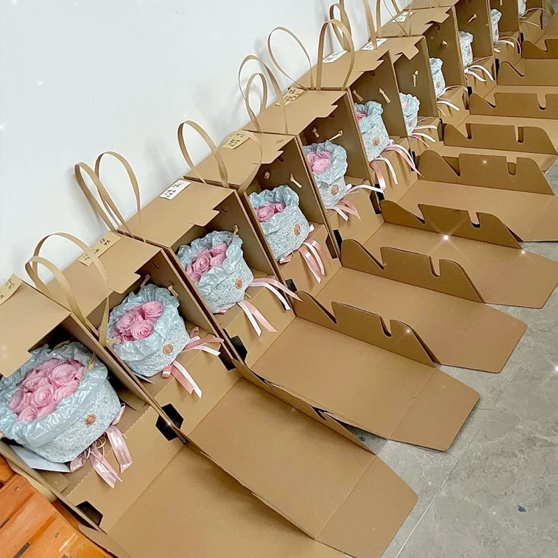 Uniforme bruine gegolfde bloemengeschenkdozen